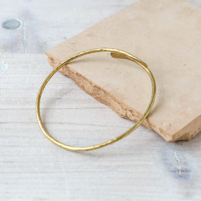 Temple Hammered Brass Bangle