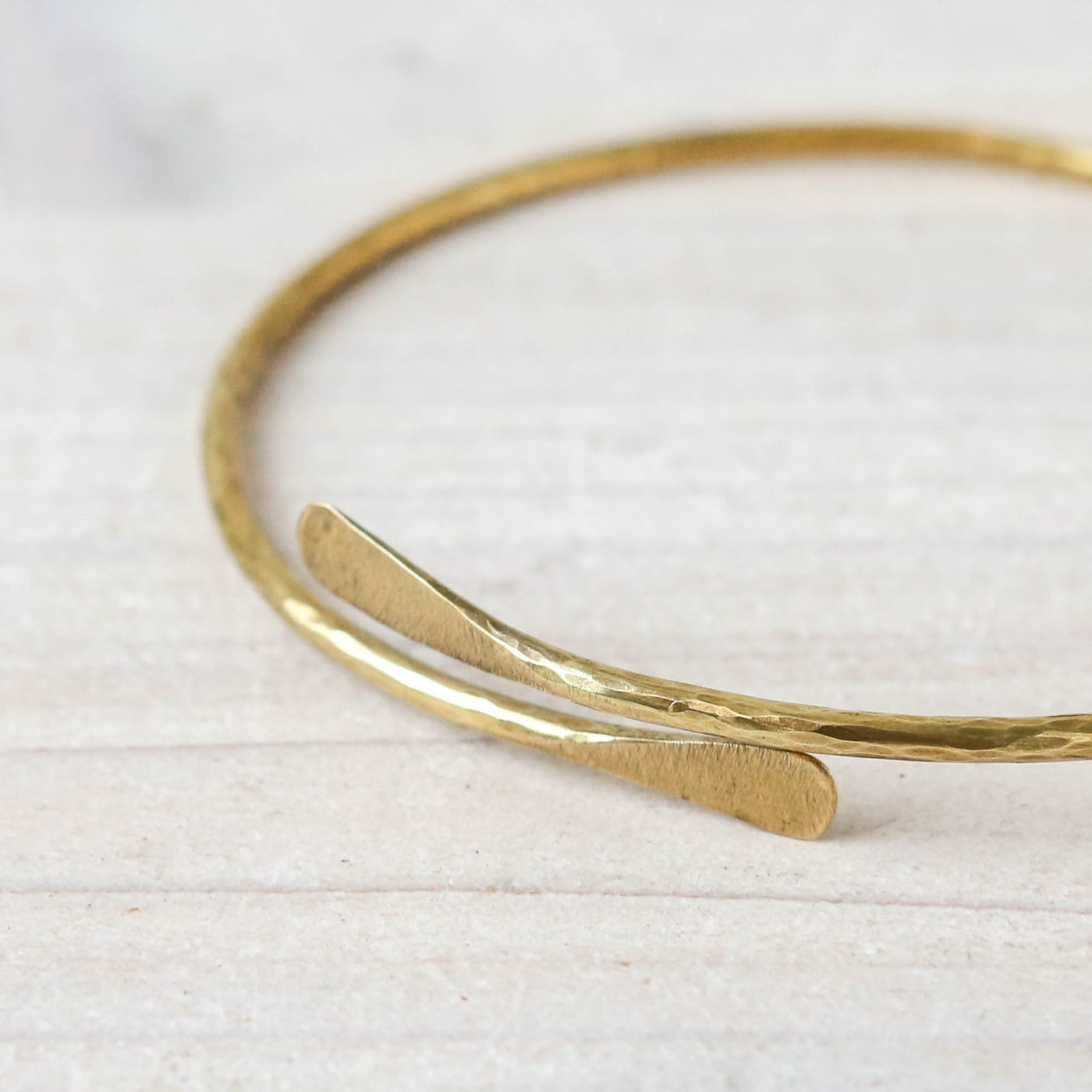 Temple Hammered Brass Bangle