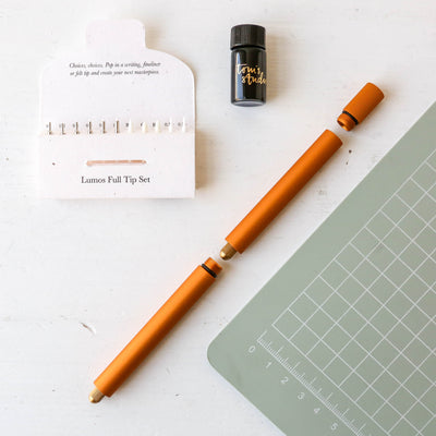 The Lumos Pro Duo Tip in Clementine - Two Refillable Pens with Multiple Tips