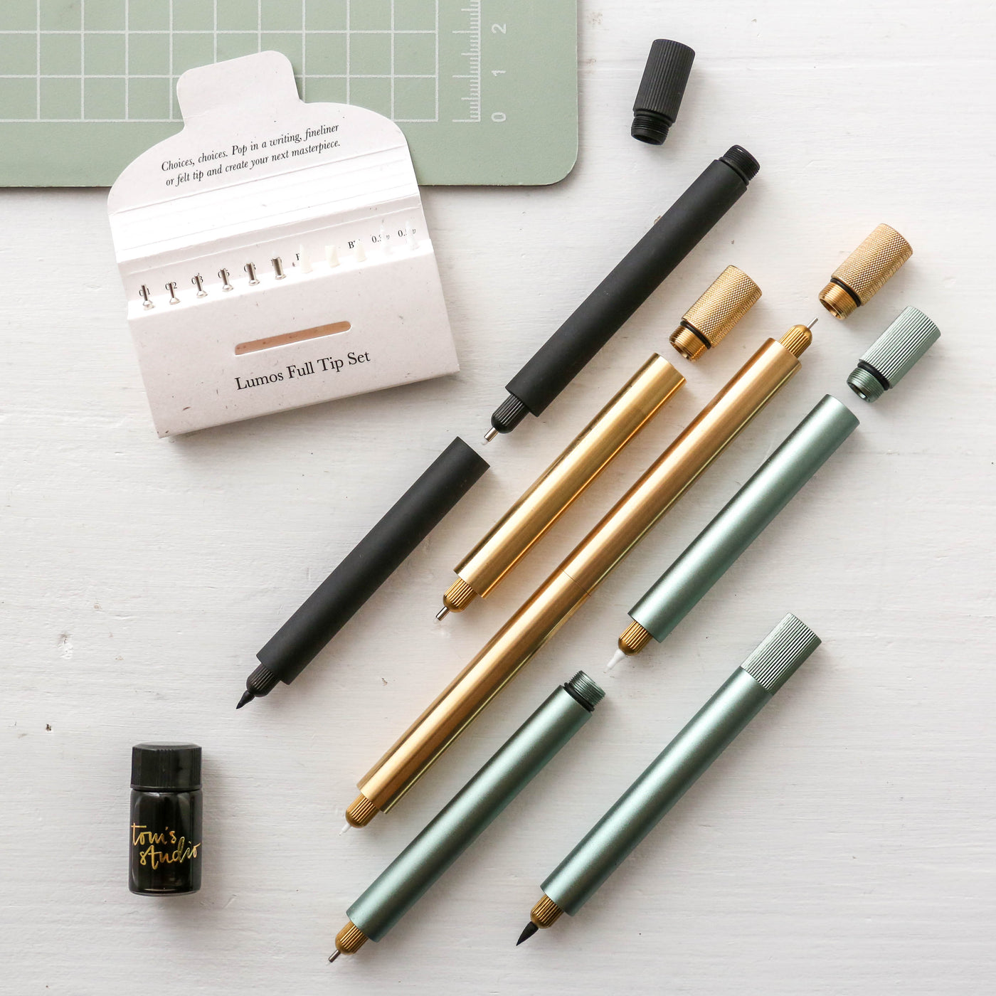 The Lumos Mini in Brass - Refillable Pen with Multiple Tips