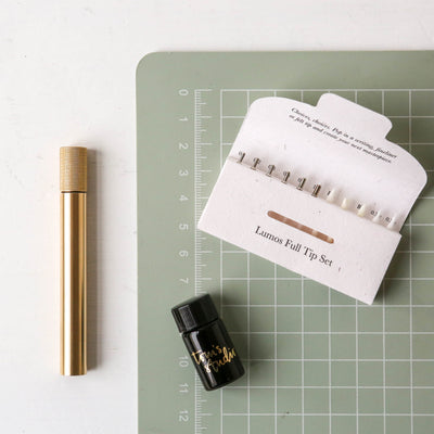 The Lumos Mini in Brass - Refillable Pen with Multiple Tips