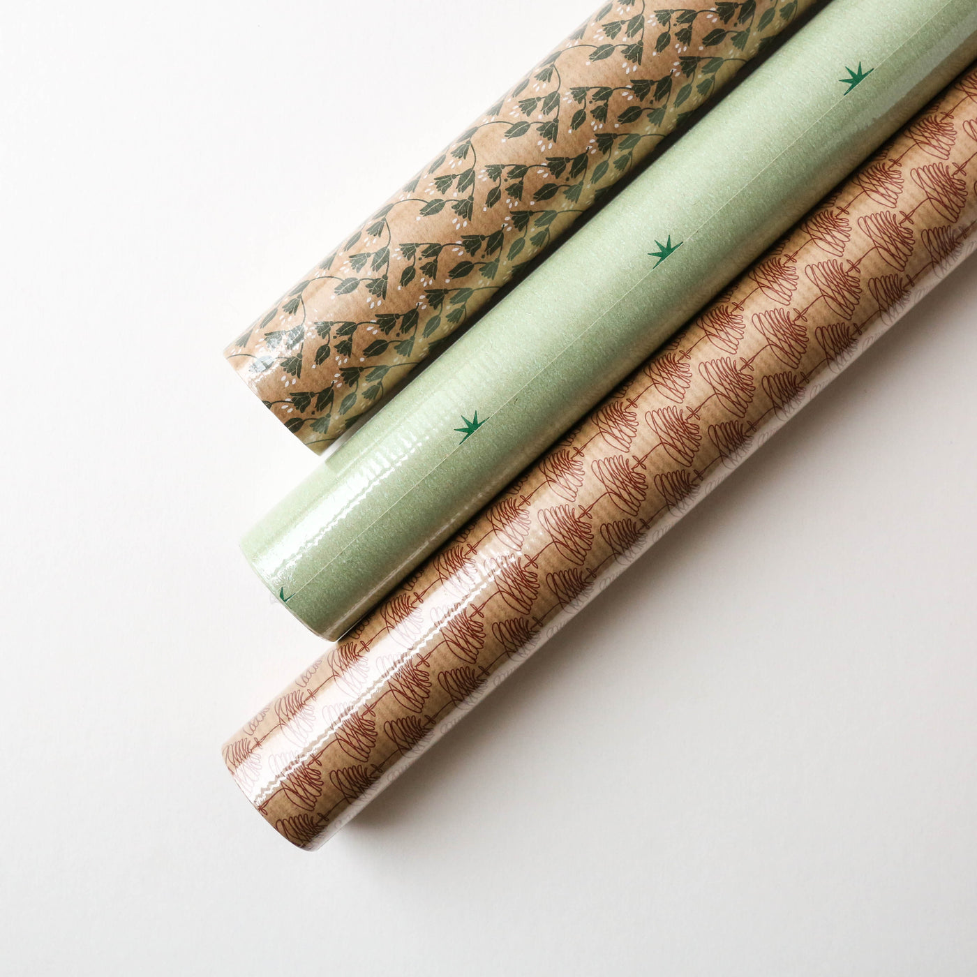 Three Rolls of Christmas Gift Wrap - Multi Patterns