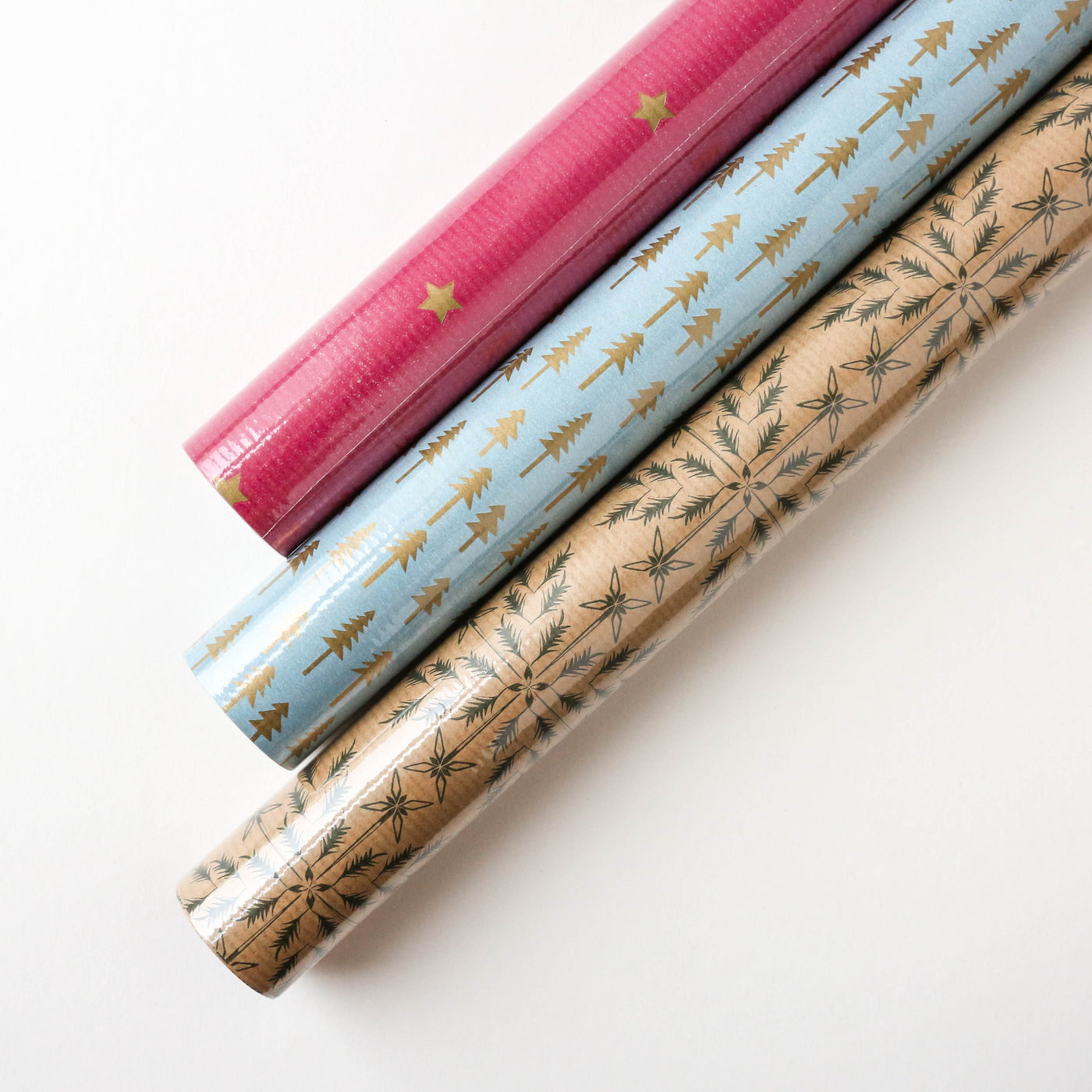 Three Rolls of Christmas Gift Wrap - Graphic Patterns